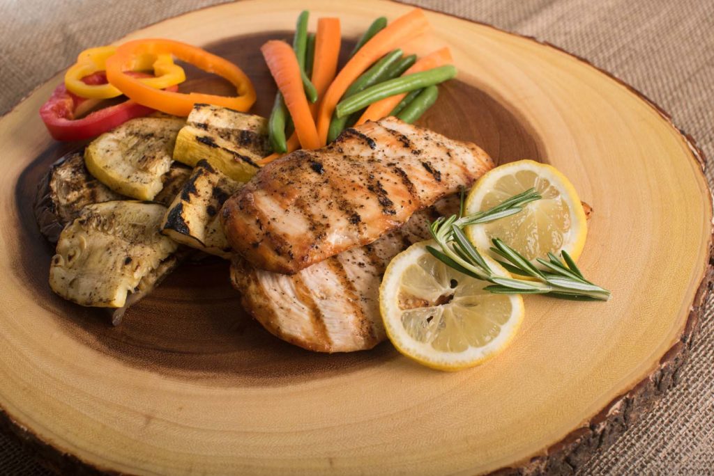 Foods like chicken, fish, and beef are high in protein